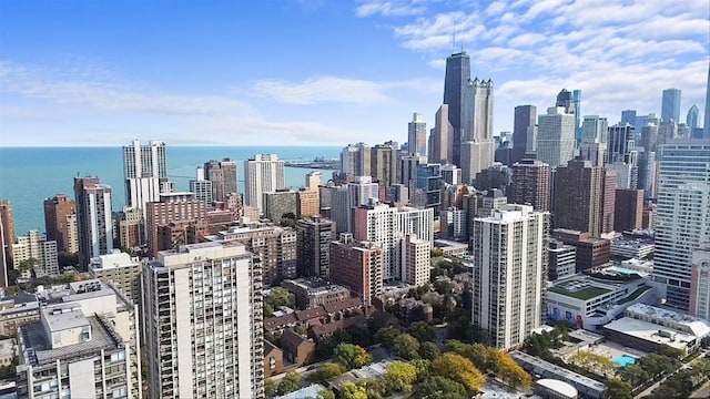 property's view of city featuring a water view