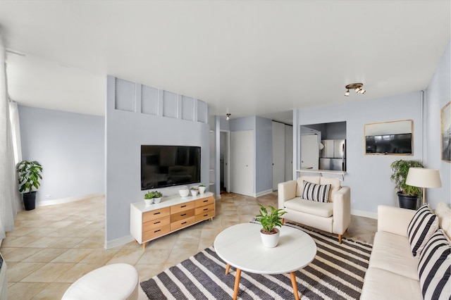 living room featuring light tile patterned floors