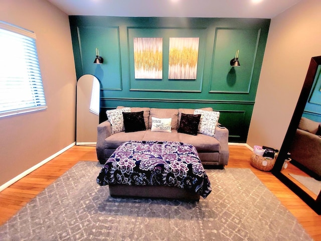 living area featuring hardwood / wood-style floors