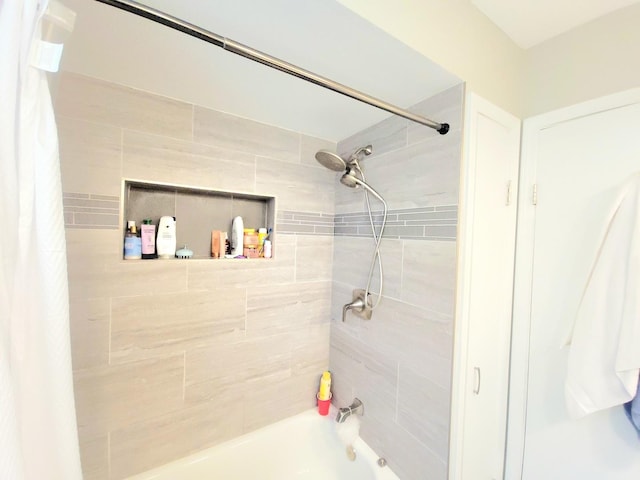 bathroom featuring shower / bath combo with shower curtain