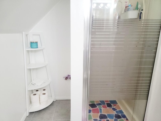 laundry room featuring wood walls and washing machine and clothes dryer