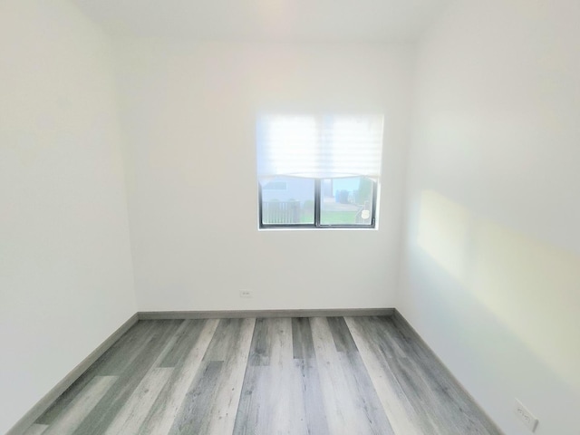 empty room with light wood-type flooring