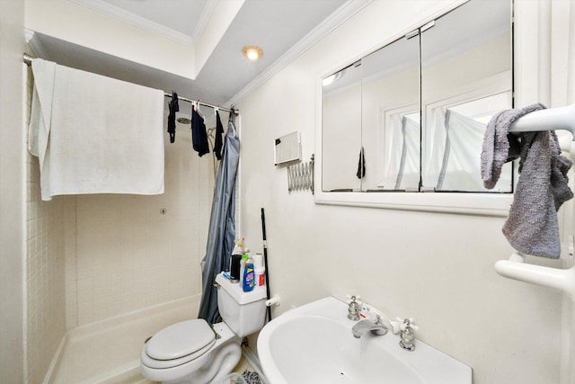 bathroom with toilet, crown molding, sink, and walk in shower