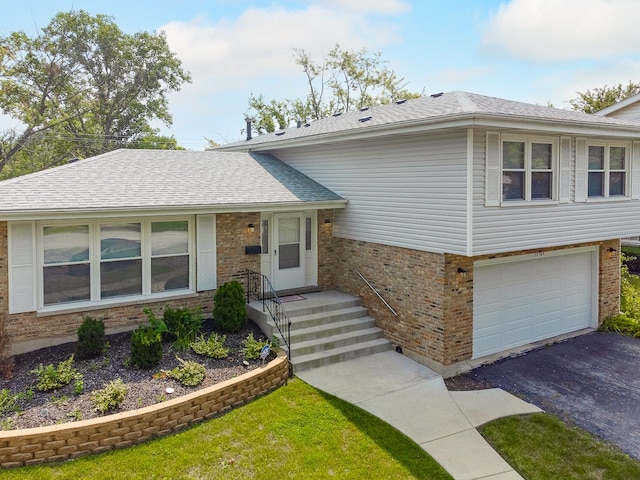 tri-level home featuring a garage