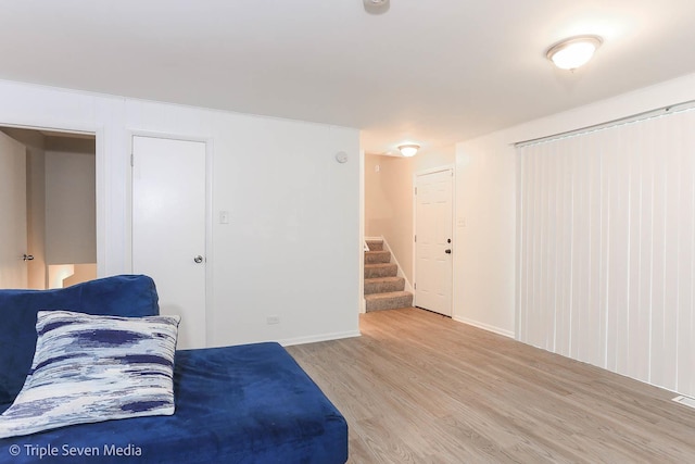 living room with light hardwood / wood-style floors