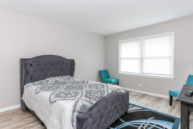 bedroom featuring light hardwood / wood-style flooring