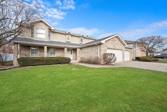 view of front facade with a garage and a front yard