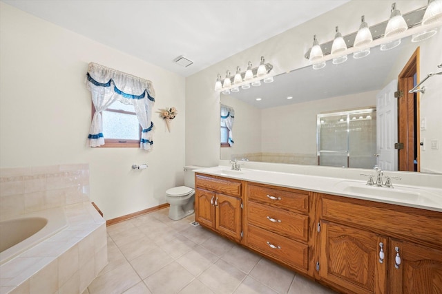 full bathroom featuring tile patterned flooring, vanity, separate shower and tub, and toilet