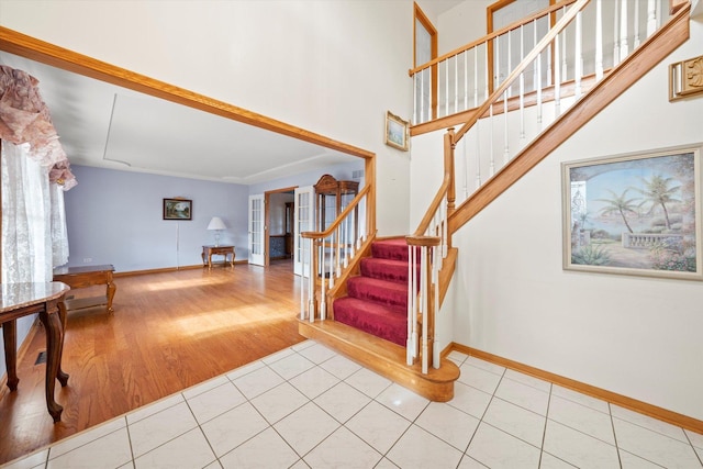 staircase with wood-type flooring