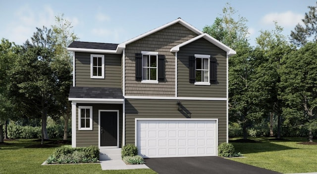 view of front of house featuring a front lawn and a garage