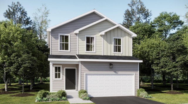 view of front facade with a front lawn and a garage