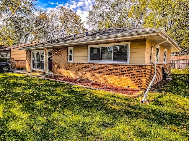 exterior space featuring a front lawn