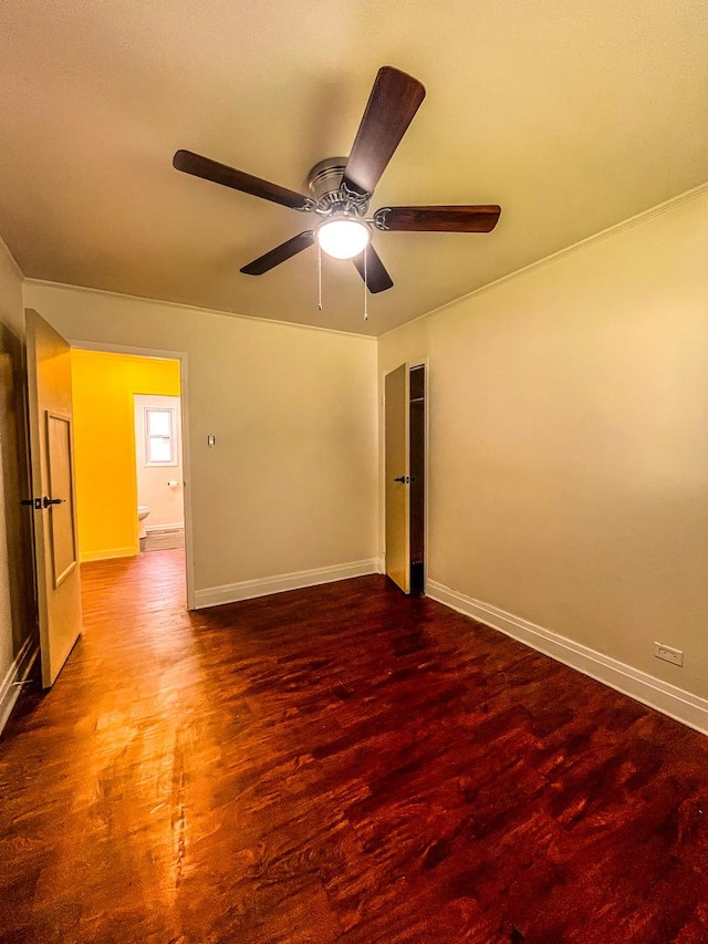 unfurnished room with hardwood / wood-style flooring and ceiling fan