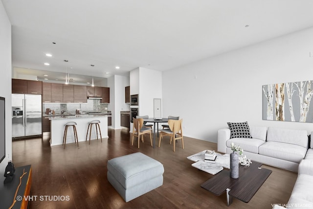 living room with dark wood-type flooring