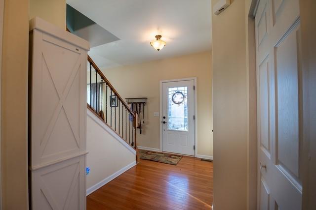 entrance foyer with hardwood / wood-style flooring