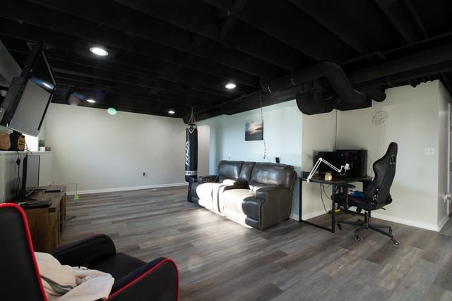 living room with dark hardwood / wood-style floors