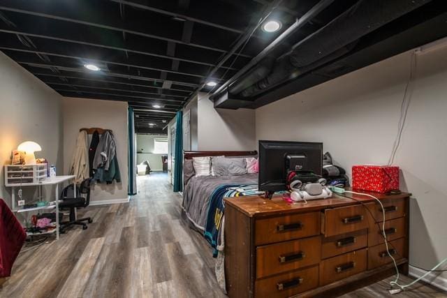 bedroom featuring hardwood / wood-style floors