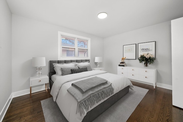 bedroom featuring dark wood-type flooring