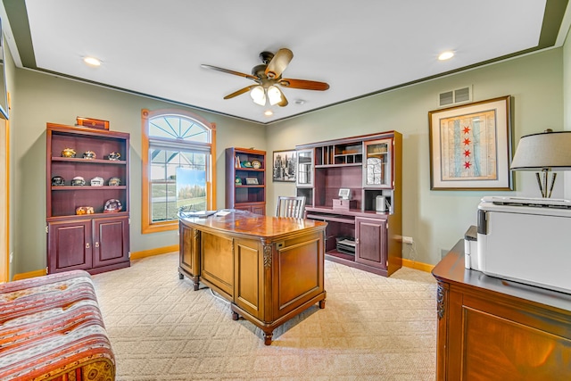 carpeted home office with ceiling fan