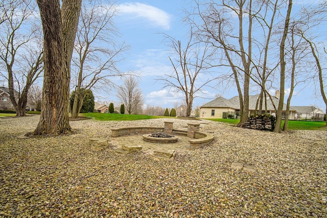 view of yard featuring a fire pit