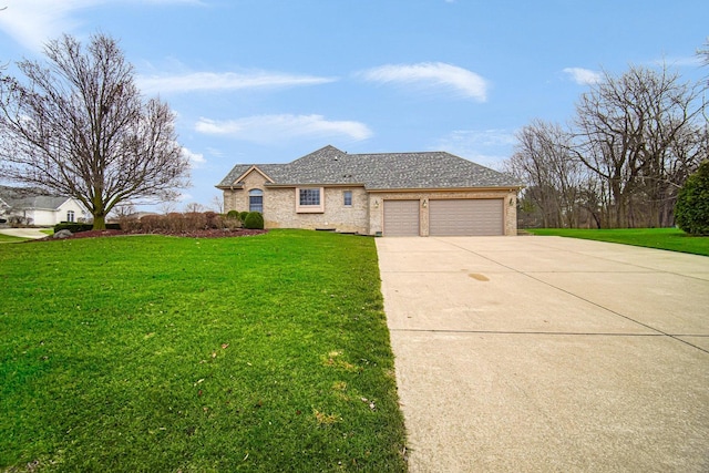 view of front facade with a front yard and a garage