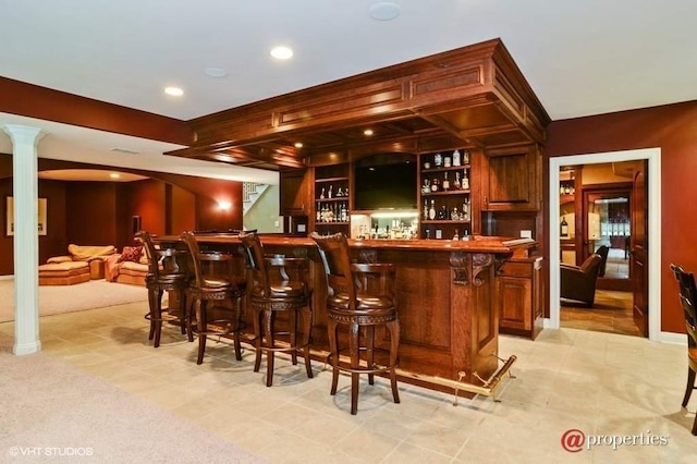 bar featuring decorative columns