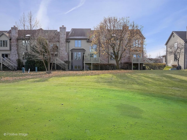 exterior space featuring a front lawn