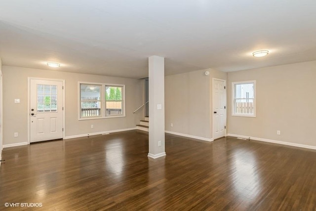 interior space with dark wood-type flooring