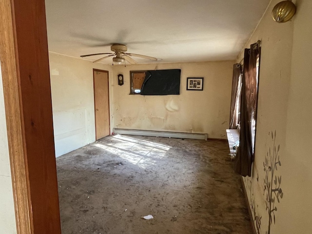 empty room with ceiling fan and a baseboard radiator