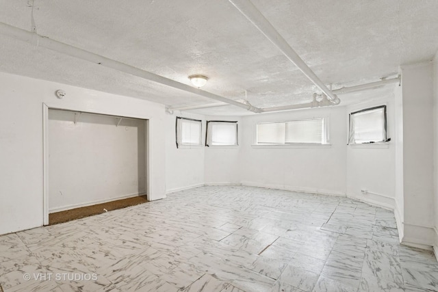 7730 S E End Ave, Chicago, IL 60649 - basement featuring a textured ceiling