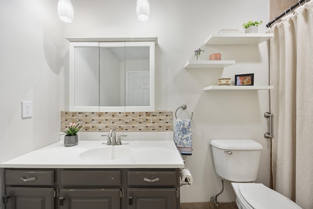 full bathroom featuring backsplash, toilet, and vanity