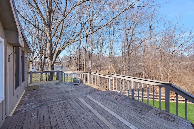 deck featuring a yard