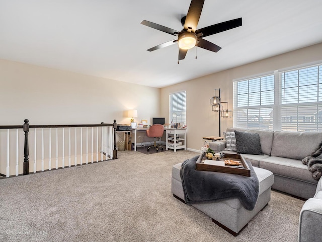 living room featuring ceiling fan and light colored carpet