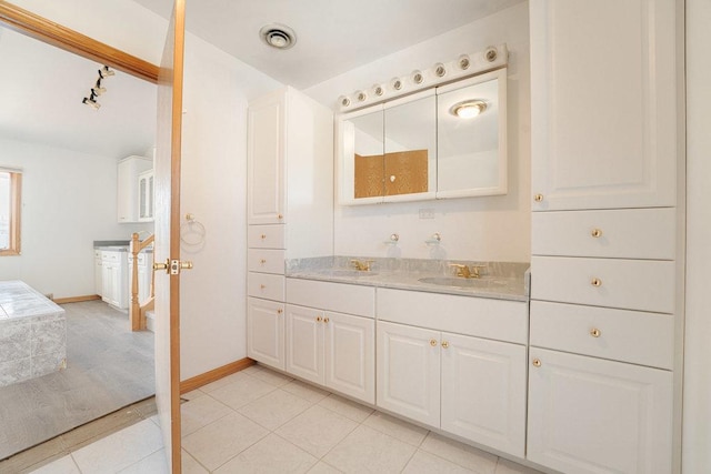 17043 Annetta Ave, Hazel Crest, IL 60429 - bathroom with vanity, baseboards, tile patterned floors, and track lighting