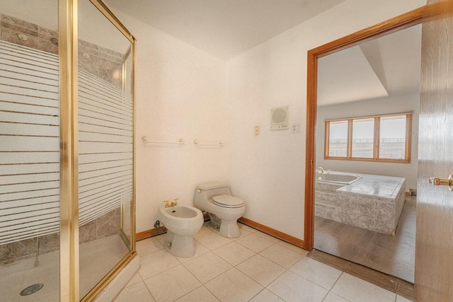 bathroom featuring an enclosed shower, tile patterned floors, a bidet, and toilet