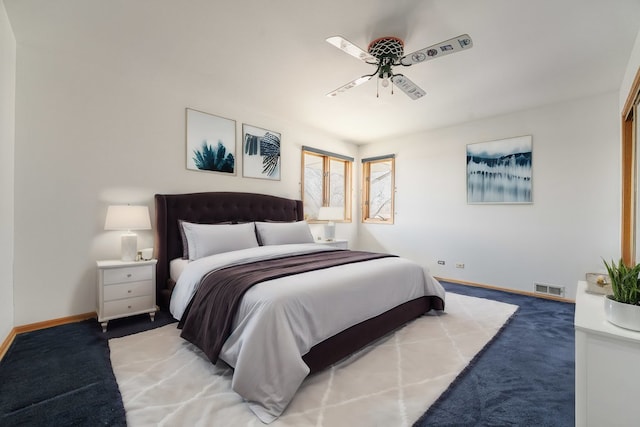 carpeted bedroom with ceiling fan