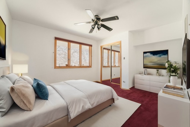 17043 Annetta Ave, Hazel Crest, IL 60429 - bedroom with dark colored carpet, a closet, baseboards, and ceiling fan