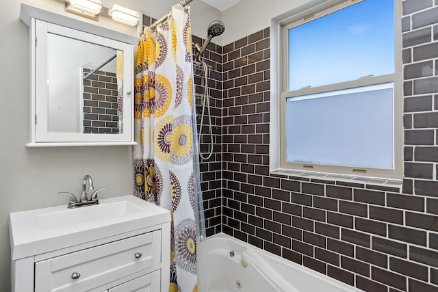 bathroom featuring vanity and shower / bath combo with shower curtain