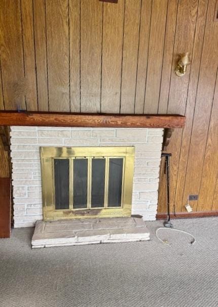 1429 N Wolf Rd, Berkeley, IL 60163 - detailed view of carpet, a glass covered fireplace, and wooden walls