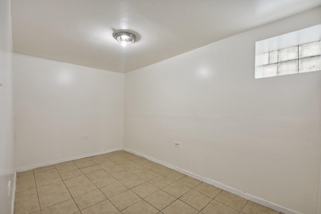 view of tiled spare room