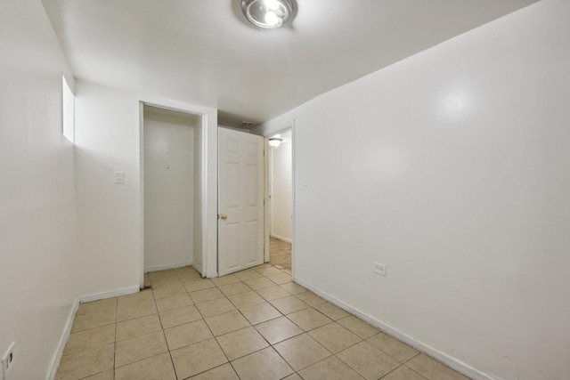 view of tiled spare room