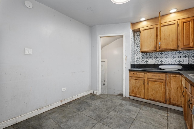 kitchen featuring tasteful backsplash