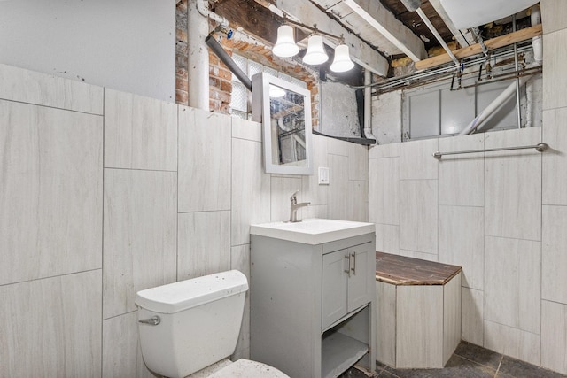 bathroom featuring toilet and vanity