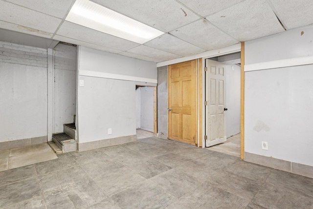 basement with a drop ceiling