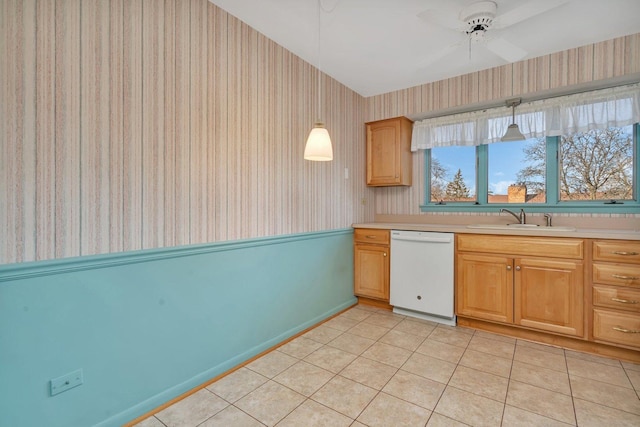 kitchen featuring dishwasher, pendant lighting, ceiling fan, and sink