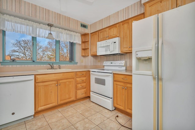 kitchen with white appliances, ceiling fan, sink, light tile patterned floors, and decorative light fixtures