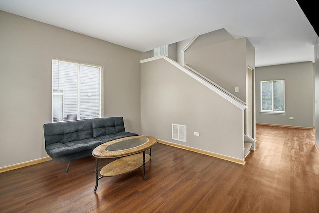 sitting room with dark hardwood / wood-style flooring