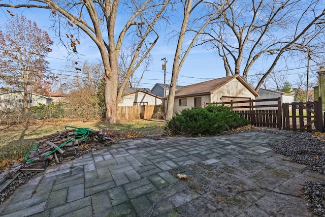 view of patio with an outdoor structure