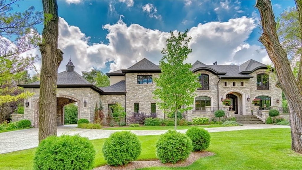 french country home with a front yard