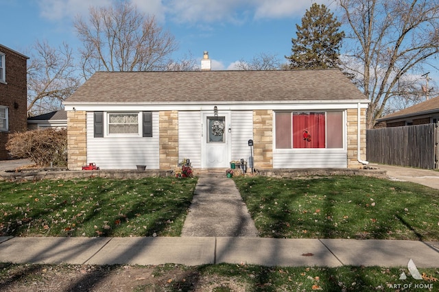 view of front of home with a front yard